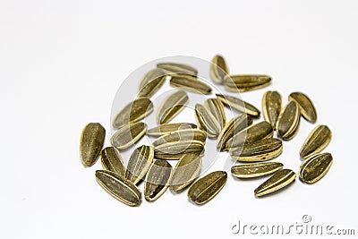 Sunflower seeds on the white background Stock Photo