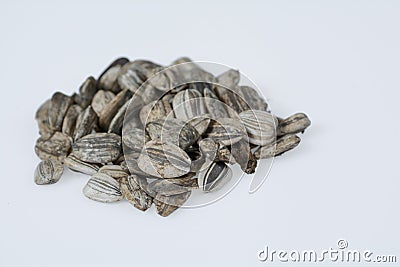 Sunflower seeds on white Stock Photo