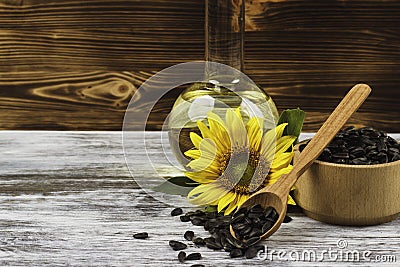 Sunflowers, bottle with oil and sunflowers seed Stock Photo