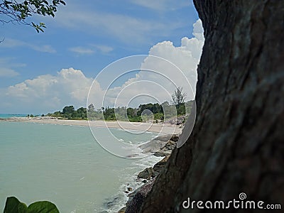Sungailiat, Bangka, Indonesia. June 2, 2022. Beautiful Batu Ketak beach in Bangka Island. Blue Cloud sky. Granite stone. Stock Photo