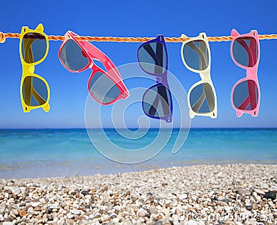 Sunglasses on the beach Stock Photo