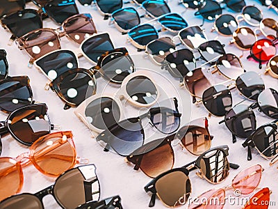 Sunglasses colourful Fashion shop display Shopping market Summer season Stock Photo