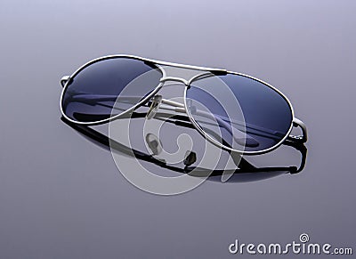 The sunglasses on grey background Stock Photo