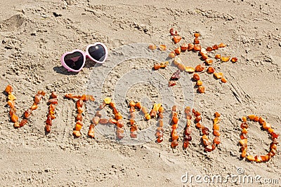 Sunglasses, inscription vitamin D and shape of sun at beach, concept of summer time and healthy lifestyle Stock Photo