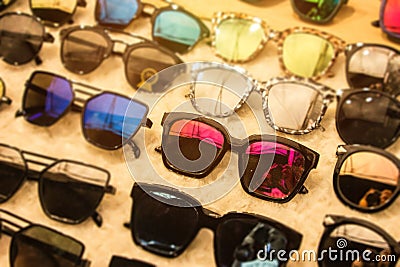 Sunglasses and lenses for cheap discounted rates at market shop with apparel 50 percent off on huge savings for stylish lenses of Stock Photo