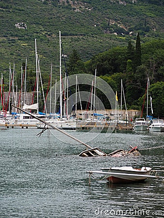 Sunk destroyed boat in harbor Stock Photo