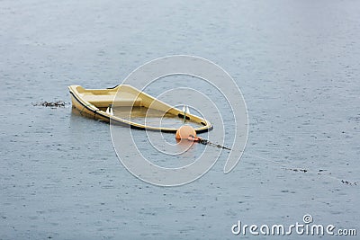 The sunken boat in a bay Stock Photo