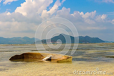 Sunken Boat on Seychelles Beach Stock Photo