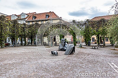 Sunken Giant sculpture at Frauenplan park near the Goethehaus in Weimar, Germany Stock Photo