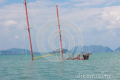 Sunken ship of the coast of an island in Thailand Stock Photo