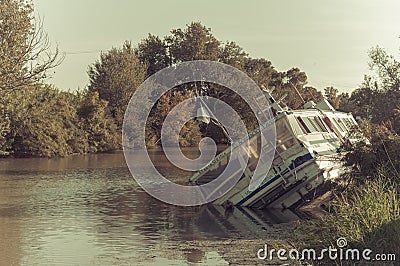 A sunken wooden boat Editorial Stock Photo