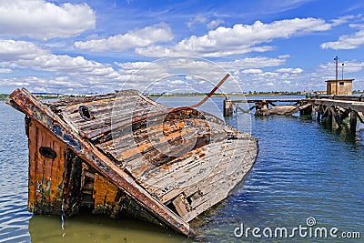 Sunken wooden ship in Seixal Bay (Tagus River),near Lisbon. Stock Photo