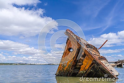 Sunken wooden ship in Seixal Bay (Tagus River),near Lisbon. Stock Photo