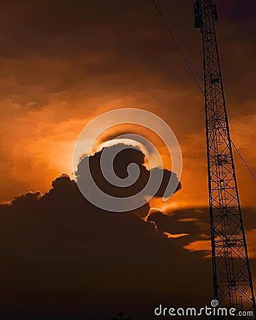 sunlight behind strange clouds Stock Photo