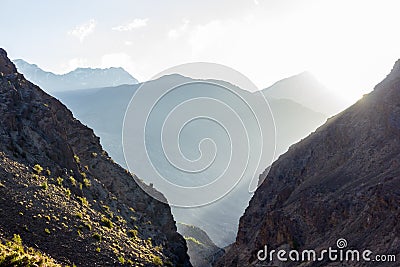 Sunlight filtering through the steep cliffs Stock Photo