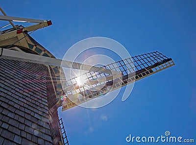 Sunlight shining in Dutch windmill sail Stock Photo