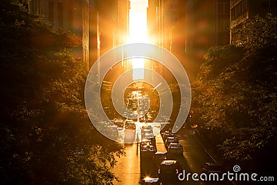 Sunlight shines between buildings of Midtown Manhattan New York City Stock Photo
