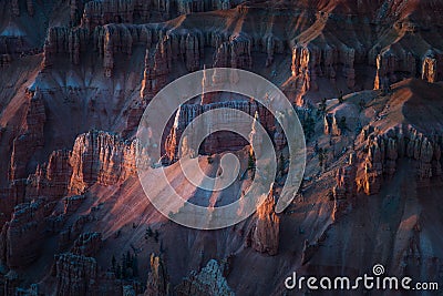 Sunlight Shining on Glowing Hoodoos Formation During Sunset in Cedar Breaks National Monument, Brian Head, Utah Stock Photo