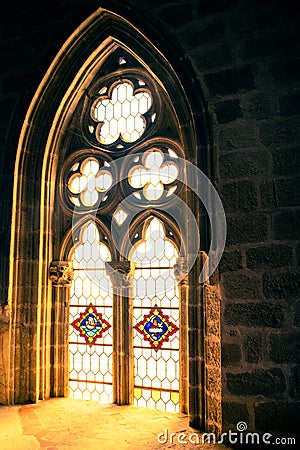 Sunlight throug ghotic church window Stock Photo