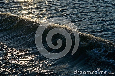 Sunlit seascape with waves Stock Photo