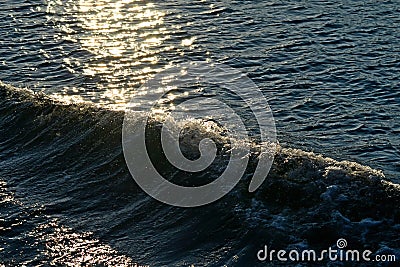 Sunlit seascape with waves Stock Photo