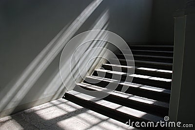 Sunlit staircase Stock Photo