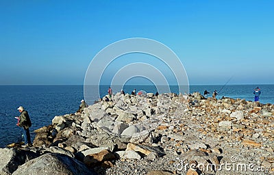 People catch fish on the Yeisk Spit Editorial Stock Photo