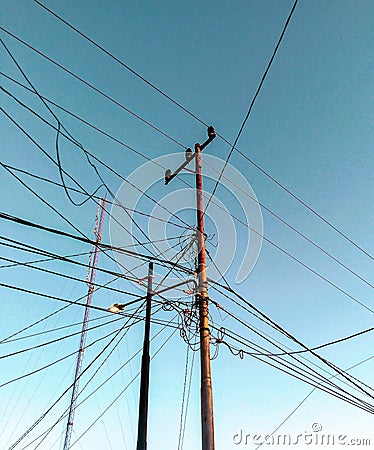 sunny city electric cable pole Stock Photo