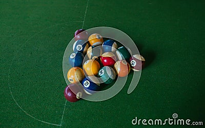 Billiards balls on green table, game in summer day Stock Photo