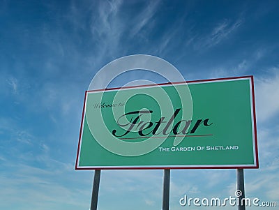 On a sunny day with blue sky, the Welcome to Fetlar sign at the Hamars Ness ferry terminal on the island of Fetlar in Shetland Editorial Stock Photo