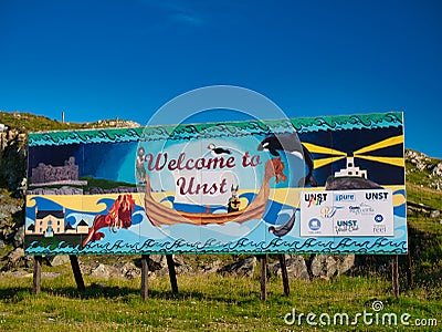 The Welcome to Unst sign at the Belmont ferry terminal on the south of the island of Unst in Shetland, UK Editorial Stock Photo