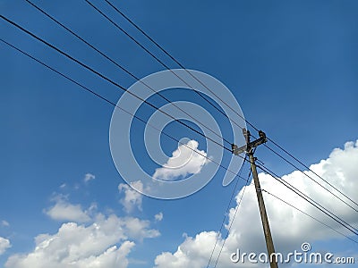 A sunny day for a lonely pole Stock Photo