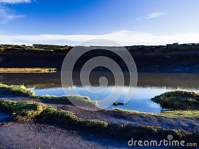 Sunny day is in mountain lake. Stock Photo
