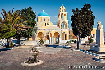 Sunny morning view of Santorini island. Picturesque spring scene of the Saint George Church, Oia, Greece, Europe. Stock Photo