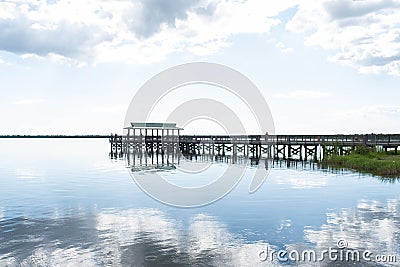 Sunny pathway and walkway over the water, Lake Trafford Stock Photo