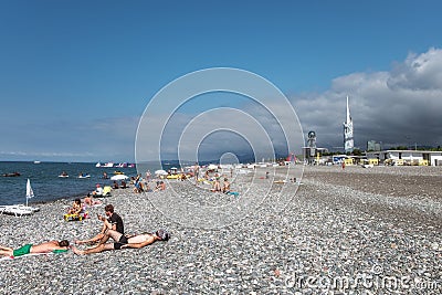 Sunny pebble beach in Batumi full of people Black sea Editorial Stock Photo