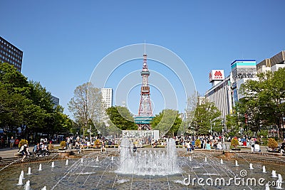 A sunny plaza with a water fountain near Sapporo TV tower Editorial Stock Photo