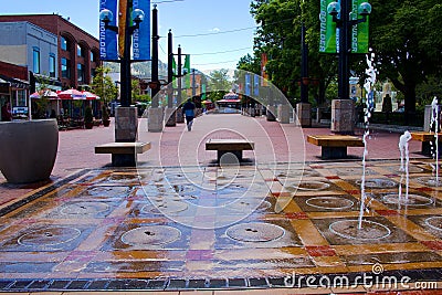 Dancing Waters on the Pearl St. Mall for people of all ages to enjoy. Bright sunny day in spring. Editorial Stock Photo