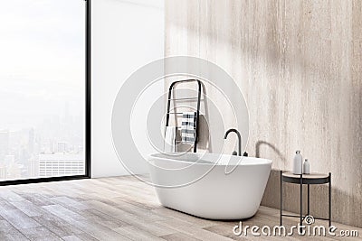 Sunny stylish bathroom with eco design, huge window with city view, white modern bath and small coffee table on wooden floor Stock Photo