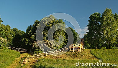 Sunny summer morning with viewing platform, stairs and lilac in Skrunda, Latvia Stock Photo