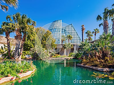 Sunny view of a green house in San Antonio Botanical Garden Editorial Stock Photo