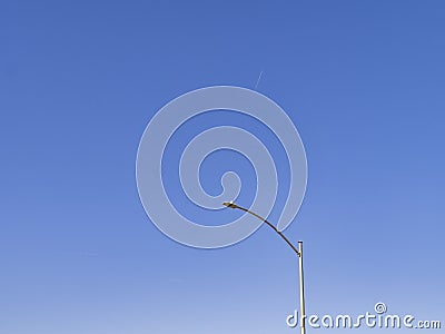 Sunny view of a street pole Stock Photo