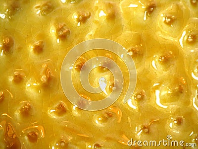 Sunny yellow lemon orange peel glossy cracks ceramics background Stock Photo