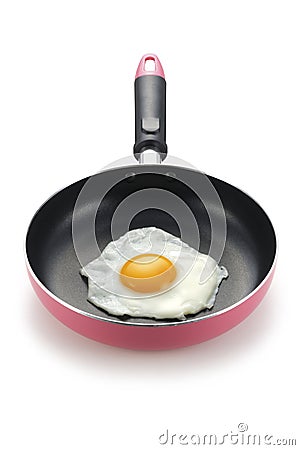 Sunnyside up fried egg in frying pan Stock Photo