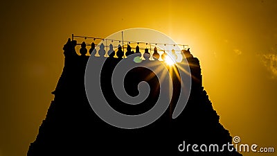 Sunrays effect (Gopuram) of Varadharaja Perumal Temple & Lord Atthi Varadar Perumal god statue inside the pond, Kanchipuram, Tamil Stock Photo