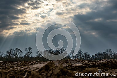 Sunrays shining through cloud cover Stock Photo
