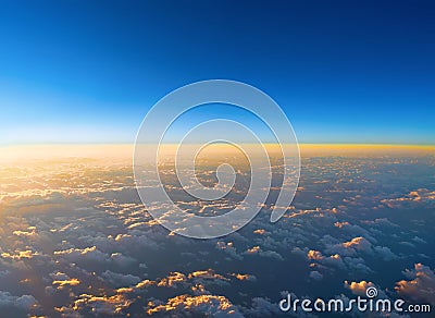 Sunrise above clouds from an airplane window. Abstract nature ba Stock Photo