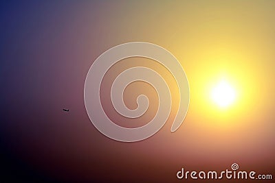 Sunrise with airplane aircraft in contre-jour Stock Photo