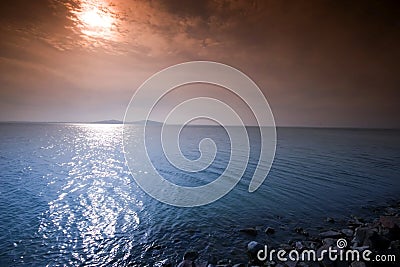 Sunrise in Balaton and stone pier Stock Photo