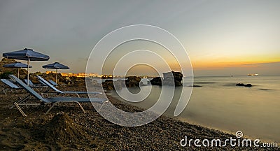 Sunrise on a beach in Rhodes, on the coast of Greece Stock Photo
